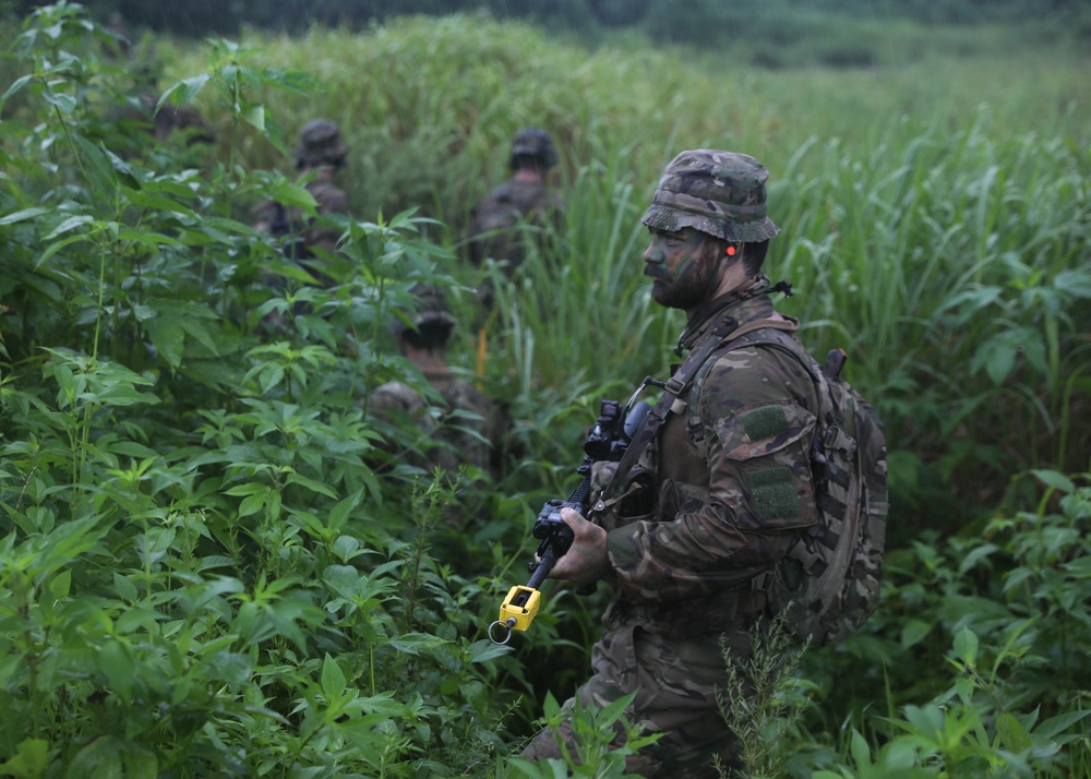 2ID leads squad field training exercise with New Zealand Army soldiers.