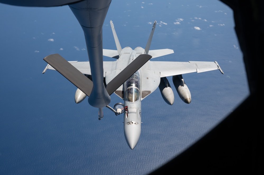Aerial allies in action: 909th ARS meets the fleet