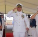 Capt. Alexander Mamikonian is piped onto stage as the keynote speaker for USS BULKELEY change of command