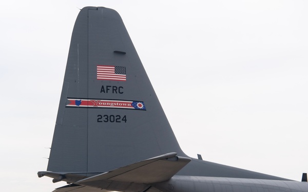 U.S. Reserve Airmen exit a C-130 Super Hercules upon arrival for Patriot Medic 25