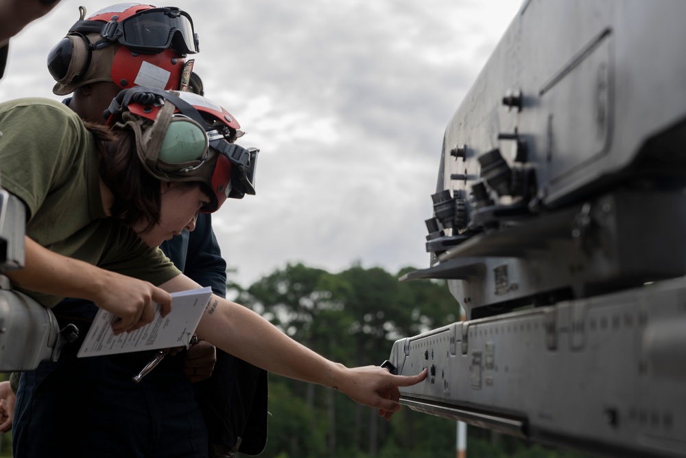 U.S. Marines with Marine Attack Squadron 223 prepare AV-8B Harriers for ordnance training