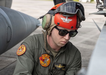 U.S. Marines with Marine Attack Squadron 223 prepare AV-8B Harriers for ordnance training
