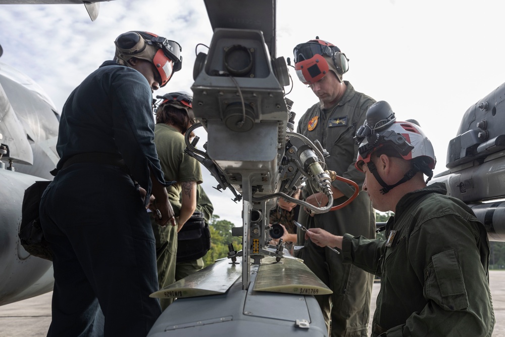 U.S. Marines with Marine Attack Squadron 223 prepare AV-8B Harriers for ordnance training