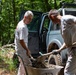 NATO-led KFOR mission along with local contractors install signs along the ABL