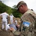 NATO-led KFOR mission along with local contractors install signs along the ABL