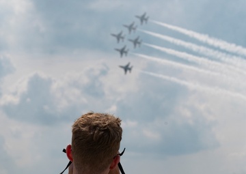 U.S. Airmen take in the action at the 2025 Fort Wayne Air Show