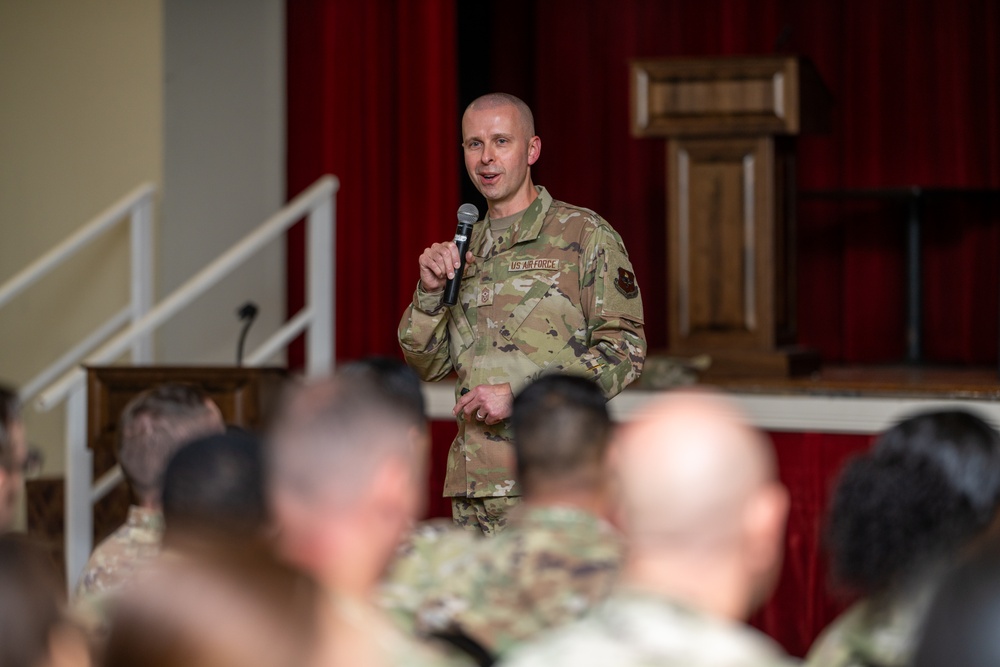 Chief Power speaks to Airmen during enlisted call at JBSA-Lackland