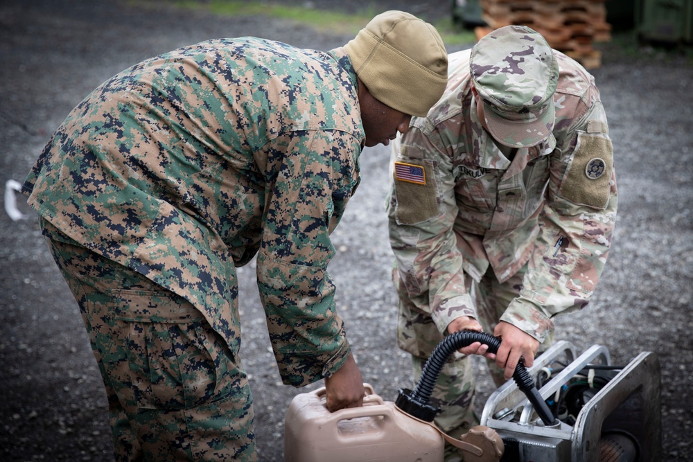 Joint effort between Marines and 770th, 771st Field Feeding Teams