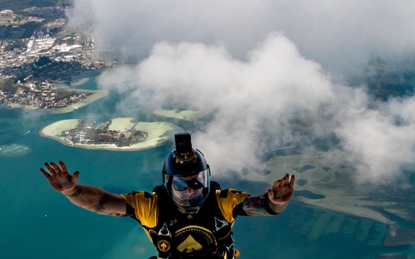 On 3: U.S. Service Members Sky Dive during the 2025 MCBH Kaneohe Airshow