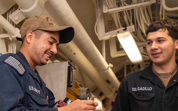 Sailors Conduct Maintenance