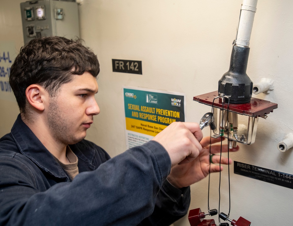 Sailors Conduct Maintenance