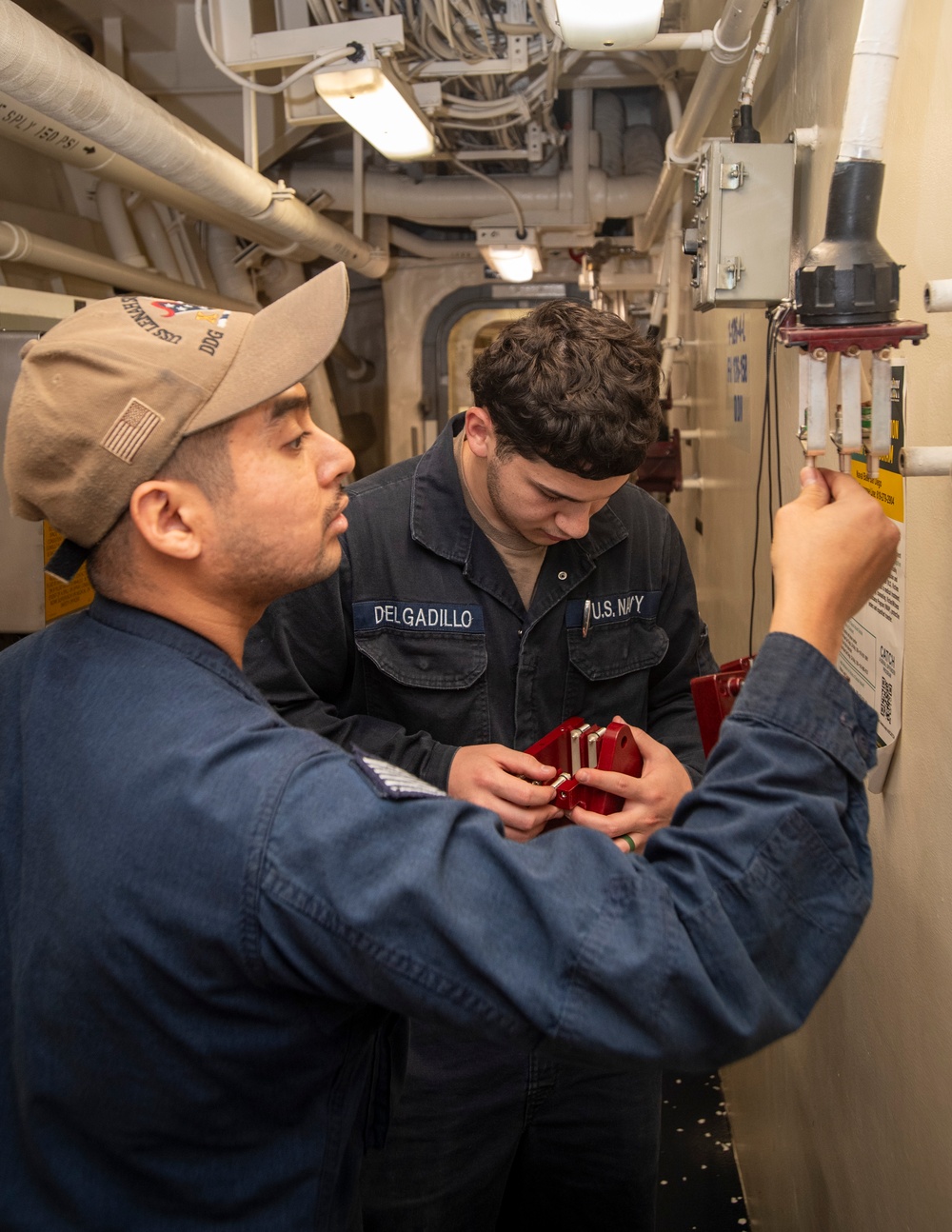 Sailors Conduct Maintenance