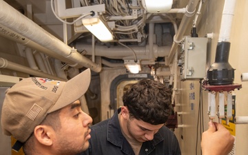 Sailors Conduct Maintenance