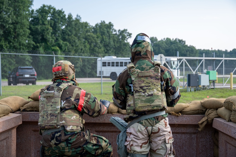 Airmen participate in an Alarm Red simulation during Northern Strike 25-2