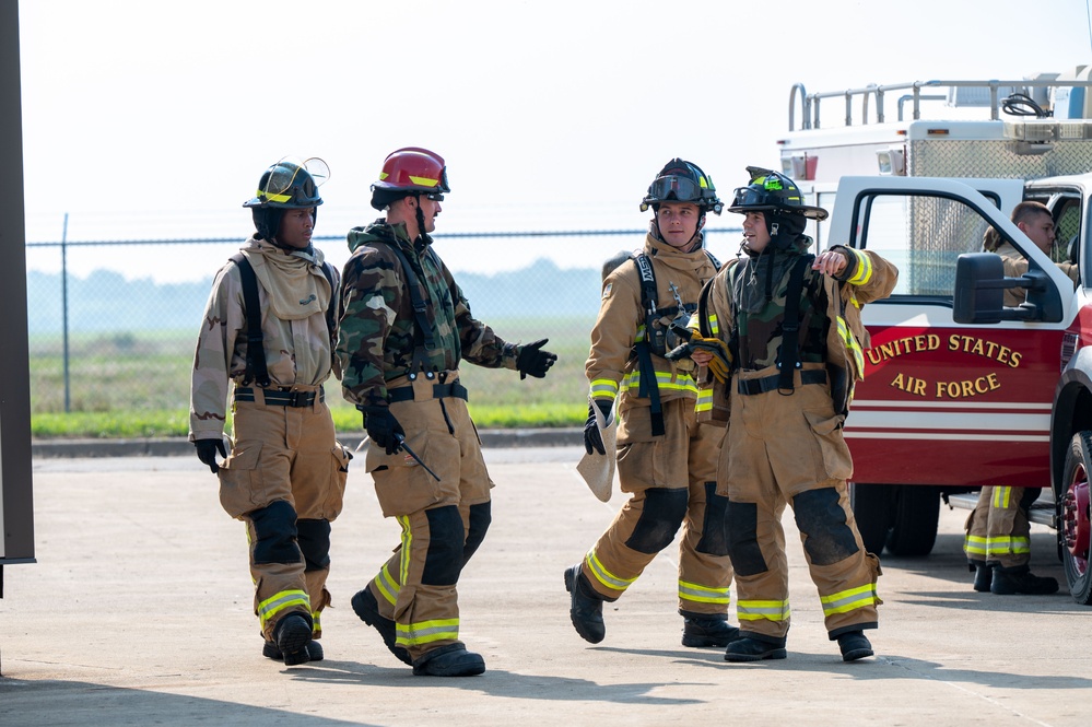 Airmen participate in an Alarm Red simulation during Northern Strike 25-2