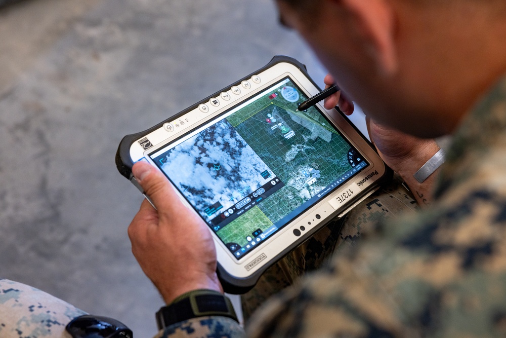 Marines with Advanced Infantry Training Battalion utilize a Vidterra Compass system to assess students