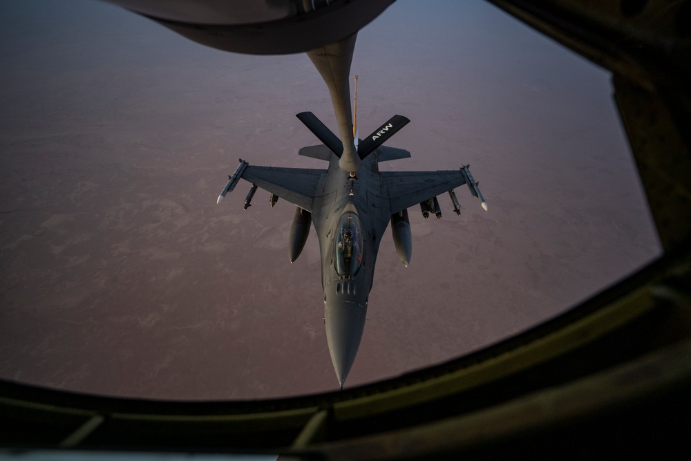 Air Force Fighting Falcons refuel with Stratotanker over USCENTCOM AOR