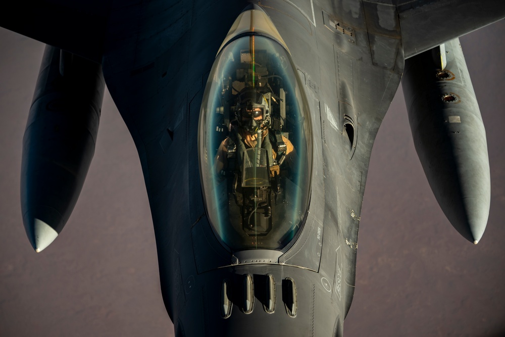 Air Force Fighting Falcons refuel with Stratotanker over USCENTCOM AOR