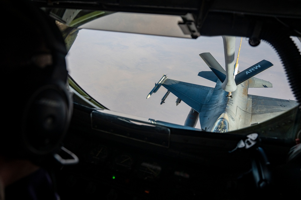 Air Force Fighting Falcons refuel with Stratotanker over USCENTCOM AOR