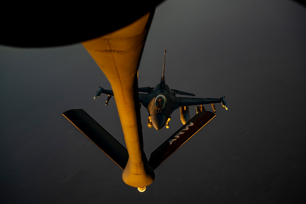 Air Force Fighting Falcons refuel with Stratotanker over USCENTCOM AOR