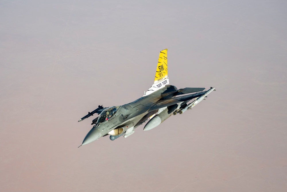 Air Force Fighting Falcons refuel with Stratotanker over USCENTCOM AOR
