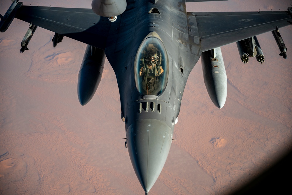 Air Force Fighting Falcons refuel with Stratotanker over USCENTCOM AOR