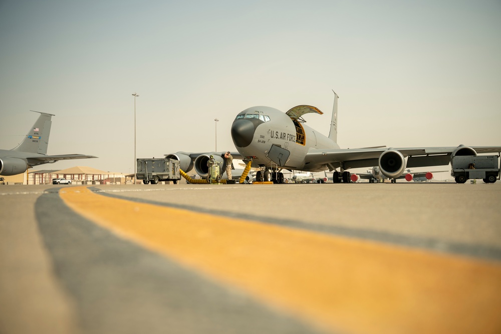 Air Force Fighting Falcons refuel with Stratotanker over USCENTCOM AOR