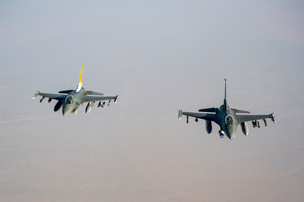 Air Force Fighting Falcons refuel with Stratotanker over USCENTCOM AOR