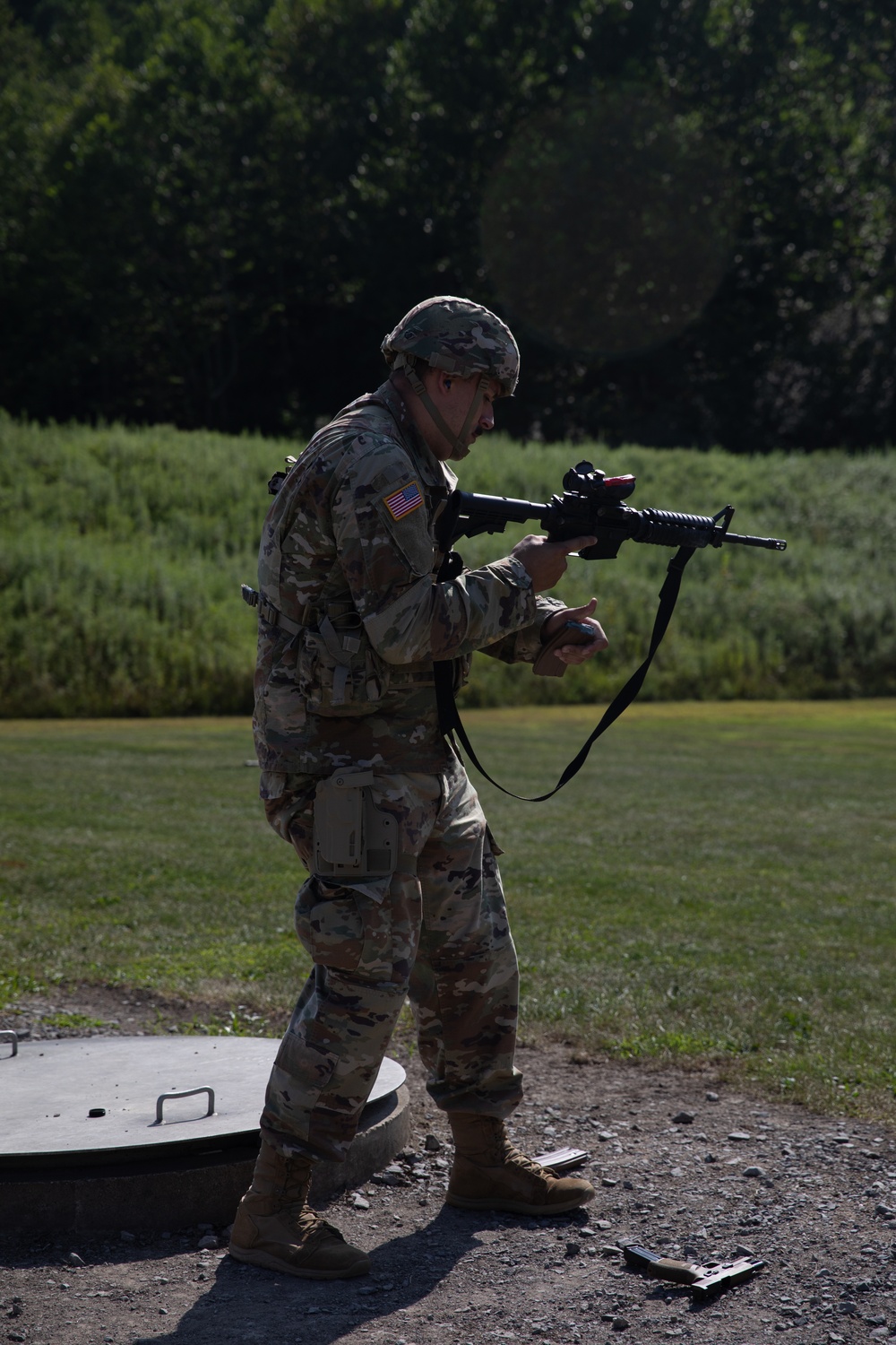 1092nd Engineer Battalion Cmd. Sgt. Maj. Hammack Shoot Match contenders compete in a rifle to pistol transition drill