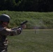 1092nd Engineer Battalion Cmd. Sgt. Maj. Hammack Shoot Match contenders compete in a rifle to pistol transition drill