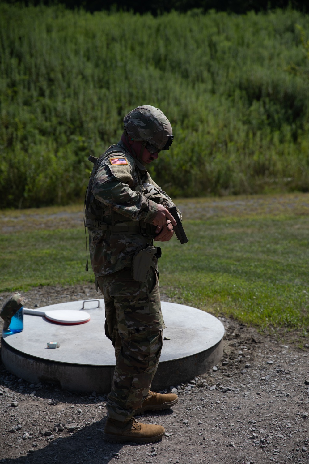 1092nd Engineer Battalion Cmd. Sgt. Maj. Hammack Shoot Match contenders compete in a rifle to pistol transition drill