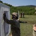 1092nd Engineer Battalion Cmd. Sgt. Maj. Hammack Shoot Match contenders compete in a rifle to pistol transition drill
