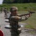 1092nd Engineer Battalion Cmd. Sgt. Maj. Hammack Shoot Match contenders compete in a rifle to pistol transition drill