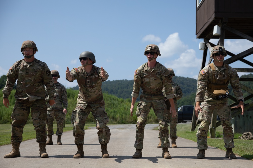1092nd Engineer Battalion Cmd. Sgt. Maj. Hammack Shoot Match competitors are physically tested with a stress shoot