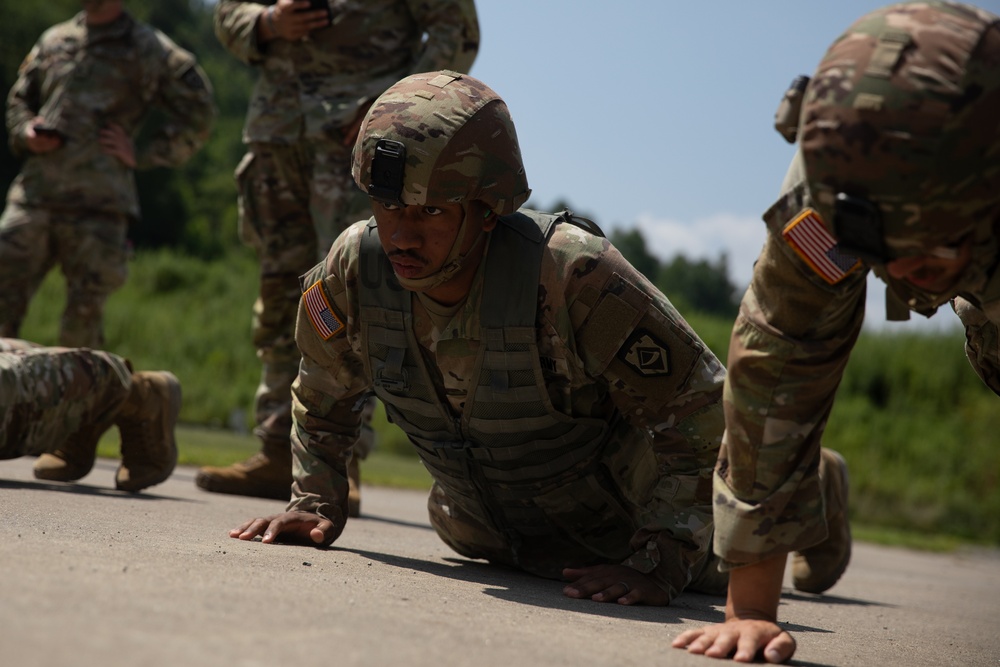 1092nd Engineer Battalion Cmd. Sgt. Maj. Hammack Shoot Match competitors are physically tested with a stress shoot