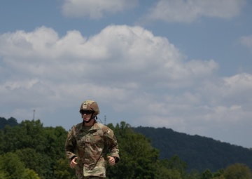 1092nd Engineer Battalion Cmd. Sgt. Maj. Hammack Shoot Match competitors are physically tested with a stress shoot