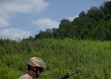 1092nd Engineer Battalion Cmd. Sgt. Maj. Hammack Shoot Match competitors are physically tested with a stress shoot