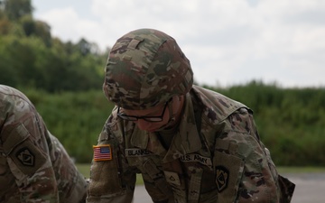 1092nd Engineer Battalion Cmd. Sgt. Maj. Hammack Shoot Match competitors are physically tested with a stress shoot