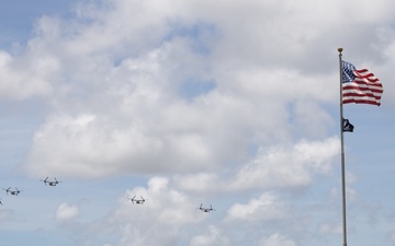 MV-22B Ospreys with VMM-265 fly in formation over Okinawa