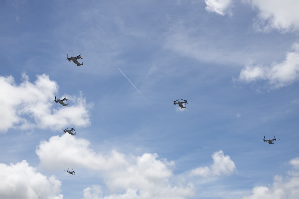 MV-22B Ospreys with VMM-265 fly in formation over Okinawa