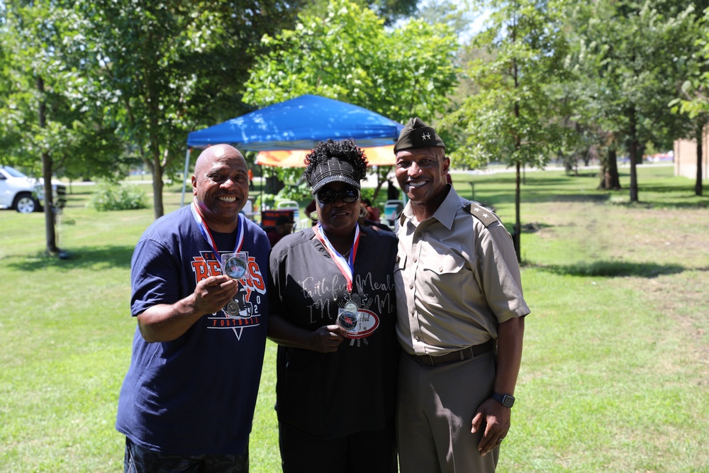 The Commander of the Illinois National Guard Presents Command Coins to Members of the 8th Infantry Association
