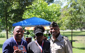 The Commander of the Illinois National Guard Presents Command Coins to Members of the 8th Infantry Association