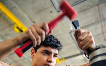 VX-1 sailor maintains aircraft equipment