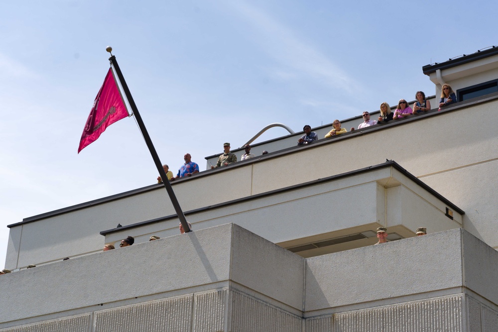 Madigan staff watch from the heights of Swan Bridge in large numbers.
