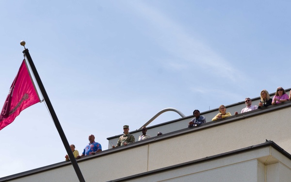 Madigan staff watch from the heights of Swan Bridge in large numbers.