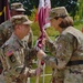 Brig. Gen. Deydre S. Teyhen, commanding general, Medical Readiness Command, Pacific &amp; director, Defense Health Network Indo-Pacific, passes colors to Madigan’s new commander, Col. James “Jimmy” Watts.