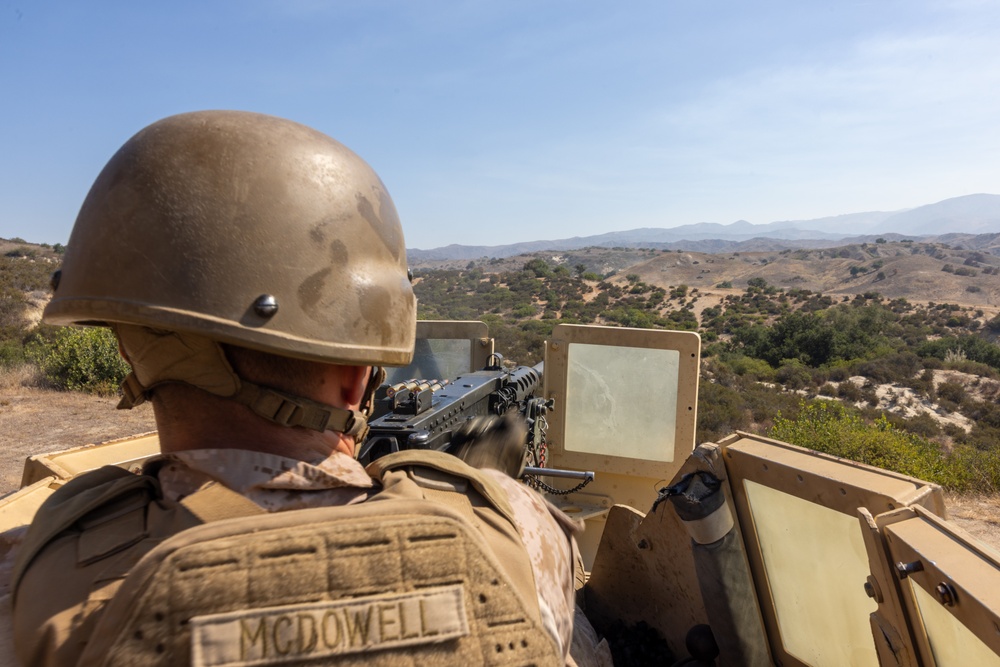 1st Bn., 1st Marines fire heavy machine guns during Bn. FEX