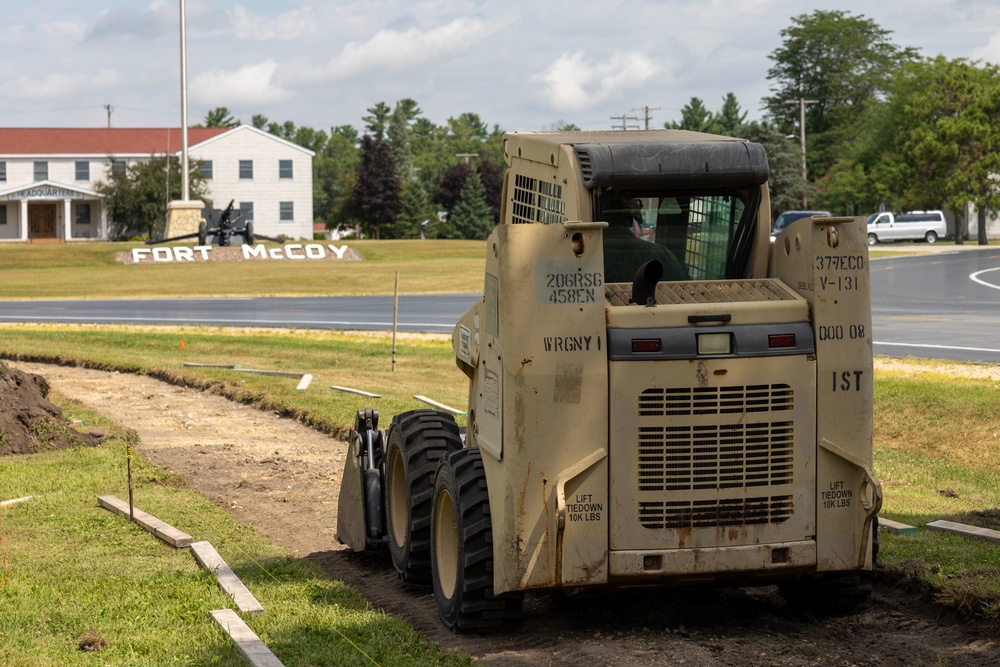 Skid-Steer Clears the Way for Sidewalk