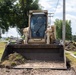 Skid-Steer Clears the Way for Sidewalk