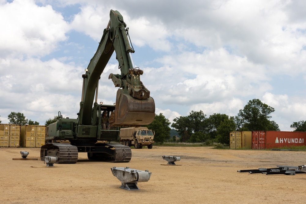 Excavator Moves into Position